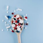 Sermorelin Injection 9 various pills wooden spoon scaled 1